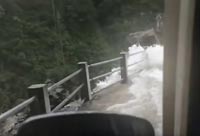 Dangerous Waterfall and Road